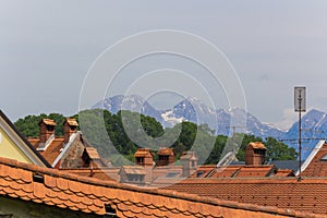 Roofs and mountains.