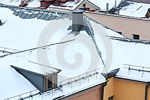 Roofs of residential houses in winter time