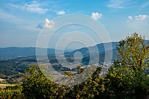 Roofs, towers and hills around the medieval town of Guardistallo