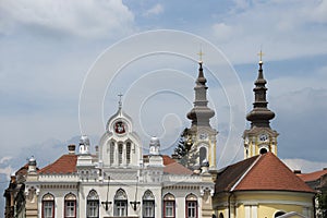 Roofs and upper part of some buildings in Unirii Square in Timisoara