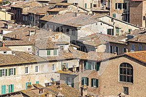 Roofs and walls of houses in Siena