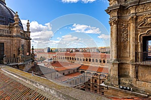 Rooftop of La Clerecia building in Salamanca, Spain with decorative baroque bell towers. photo