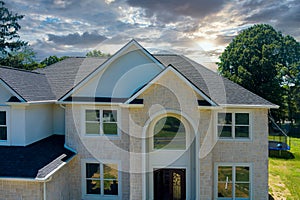 Rooftop in a newly home constructed showing asphalt shingles multiple roof lines