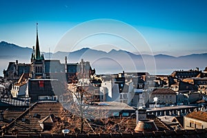 Rooftop skyline view of the old city of Lausanne Switzerland with Lake Geneva