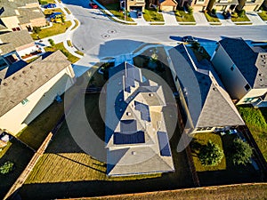 RoofTop Solar Panels Aerial above Suburban Home providing clean sustainable green energy