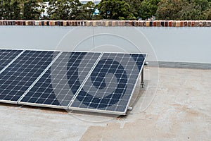 Rooftop solar panels on top of an apartments in australia photo