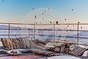 Rooftop terrace in Turkish style with balloons in background photo