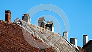 Rooftops and chimneys - Blue sky