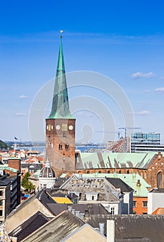 Rooftops and church tower in the skyline of historic Aarhus