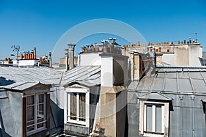 Rooftops of the houses in Paris with Chimneys