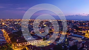 Rooftops of Porto's old town on a warm spring evening timelapse day to night, Porto, Portugal