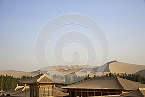 Rooftops and Singing Sand Mountain, Taklamakan Desert, Dunhuang, China