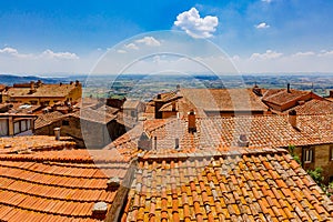 Rooftops and view of landscape in Cortona, Italy
