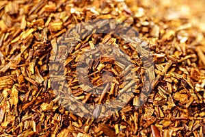 Rooibos close-up, Macro of redbush tea close-up. Leaving South Africa. Selective focus