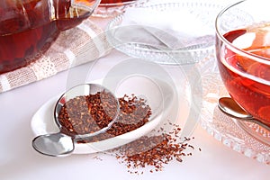 Rooibos tea and tea leaf photo