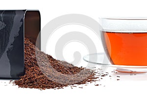 Rooibos in a tin and cup.