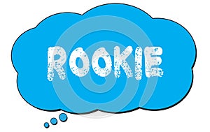 ROOKIE text written on a blue thought bubble