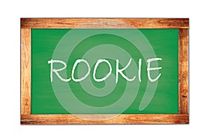 ROOKIE text written on green school board