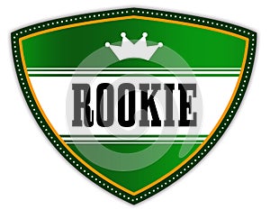 ROOKIE written on green shield with crown.