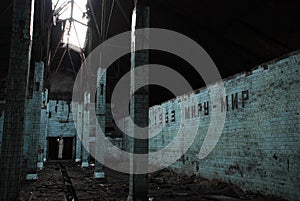 Room of an abandoned factory destroyed photo