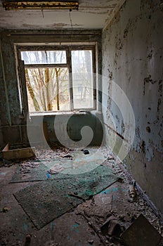Room in abandoned hospital, dead ghost town of Pripyat in Chernobyl NPP alienation zone, Ukraine