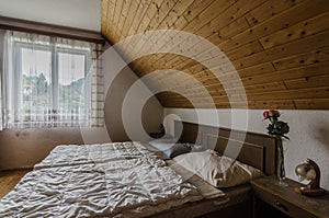 room with bed in attic of old inn