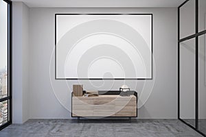 Room with blank poster on wall