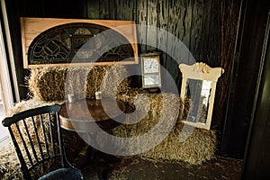 Western Room With Hay Bales And Clocks