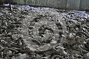 Room of dusty gasmasks Pripyat Chernobyl Ukraine