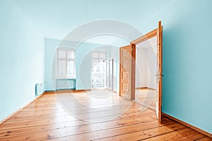 Room in empty flat with colored walls after renovation