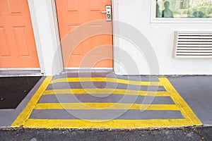 Room entrance with ramp for disabled person wheelchair