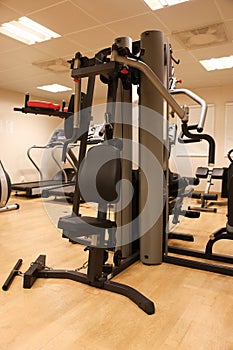 Room with gym equipment in the sport club, sport club gym , Health and recreation room