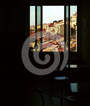 Room hostel with window overlooking the buildings of Portovenere