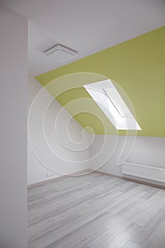 Room with inclined wall photo