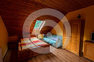 Room interior with a king size bed at local hotel