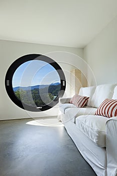 Room with large porthole