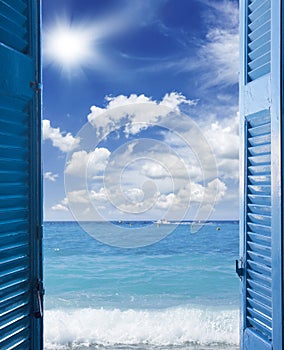 room with open door to seascape