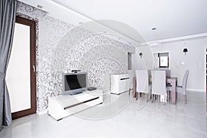 Room with patterned wallpaper