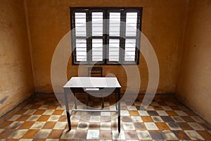 Room with a table, ascetic and old with tiles photo