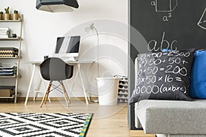 Room with walls with mathematics formulas