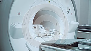 Room with white magnetic resonance tomograph for examination