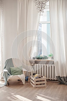 Room with white walls and a large window