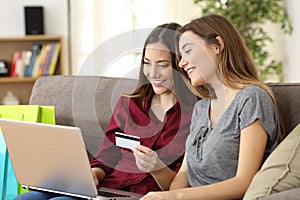 Roommates buying on line with credit card photo