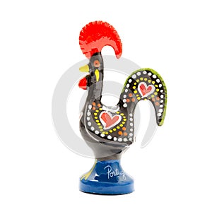 Rooster of Barcelos souvenire on white background, studio photo