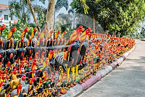 rooster statues offerings Wat Yai Chai Mongkhon Ayutthaya bangkok Thailand photo
