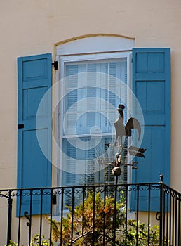 Rooster weathervane at balcony