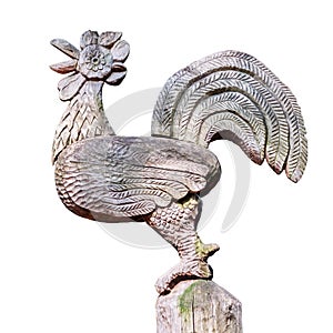 Rooster wood carving on white background