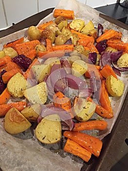 Root vegetables on a baking tray