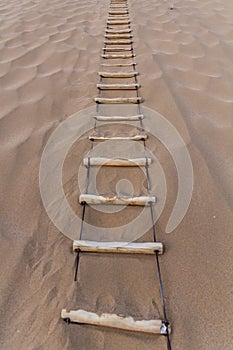 Ropa ladder at Singing Sands Dune near Dunhuang, Gansu Province, Chi