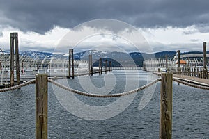 Rope barrier near an empty harbor